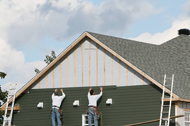 Professional Siding Replacement technician working in Newington, VA